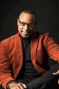 Skip Martin Promo Photo Red Jacket Turtle Neck Photo Credit Kouichi Teragashi 200x300